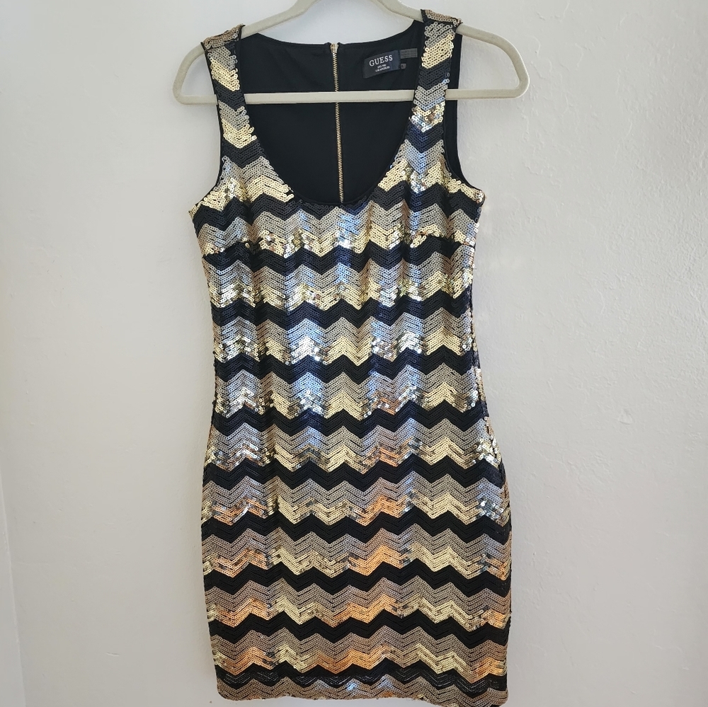 Black and gold sequin dress
